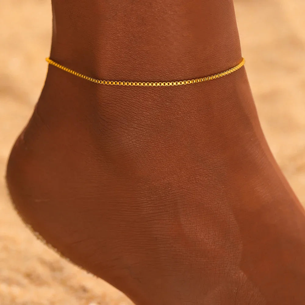 Snake chain anklet worn on model's ankle, Varex HQ