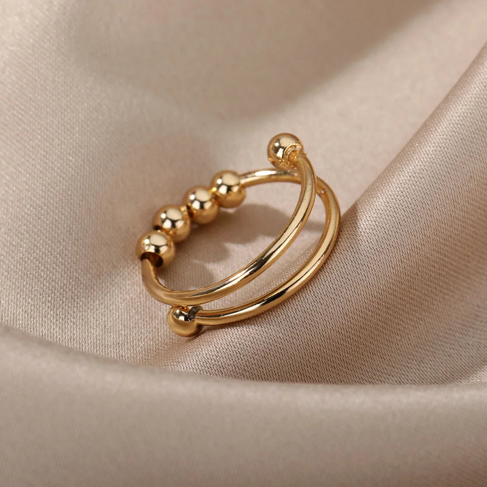 Gold-tone stainless steel spinner fidget ring finish