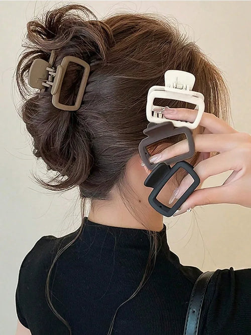 4-Piece Square Hair Claw Clip Set in acrylic, assorted colours, front view - Varex HQ