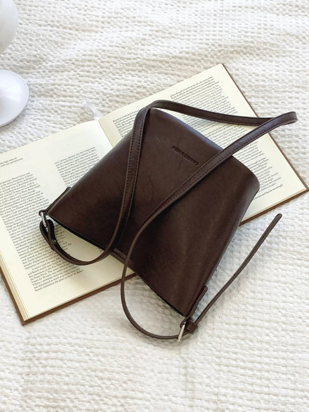 Vegan Leather Bucket Crossbody Bag - texture close-up