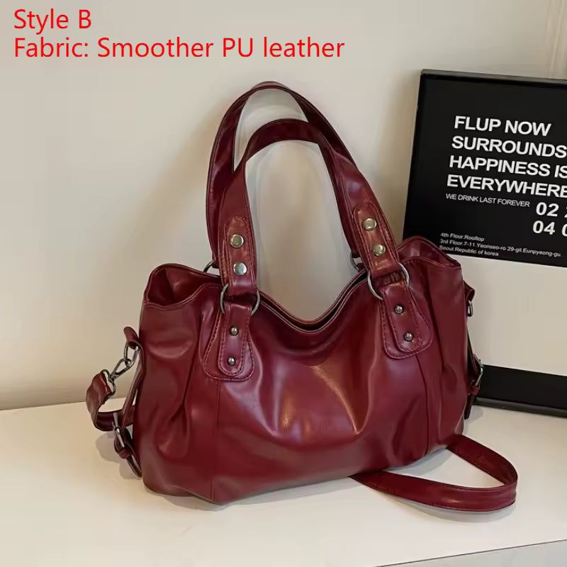 Vertical-Zip Vegan Leather Multi-Compartment Tote in wine red, 36x25x15cm, studio product shot showing structured silhouette and buckle strap detail – Varex HQ