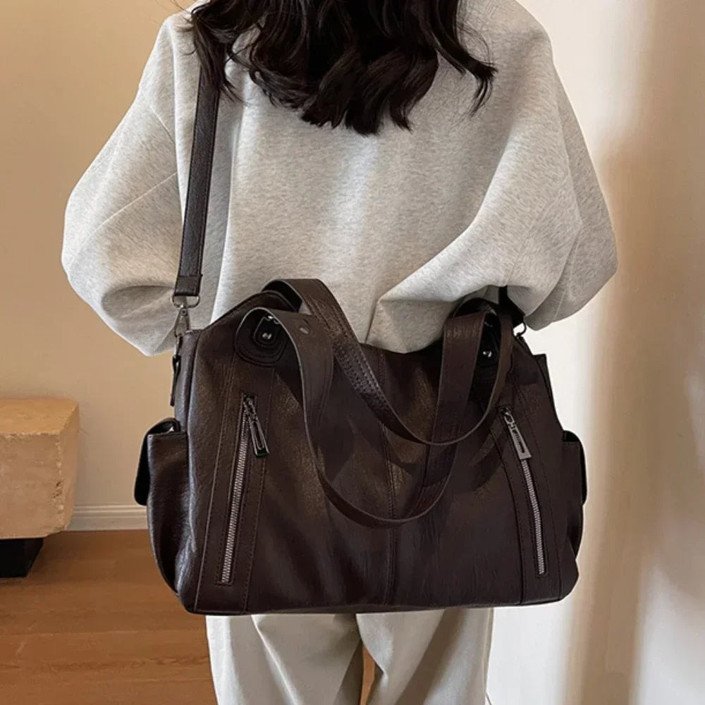 Vertical-Zip Vegan Leather Multi-Compartment Tote in dark brown, back view showing dual front zip pockets and wide tote handles – Varex HQ