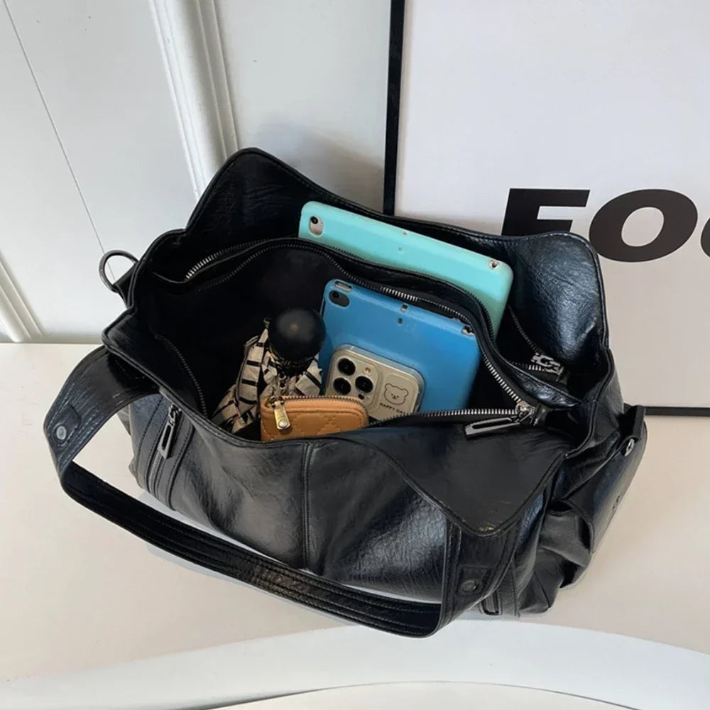 Vertical-Zip Vegan Leather Multi-Compartment Tote in black, open interior view showing spacious multi-compartment lining – Varex HQ