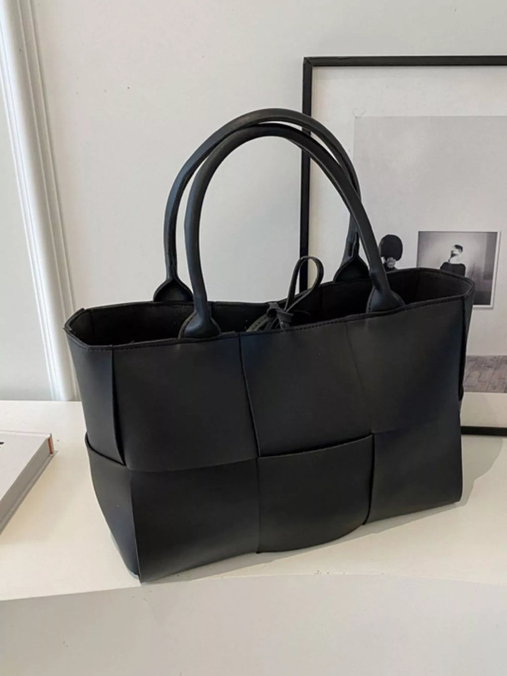 Woven tan vegan leather tote bag - side angle showing structured silhouette